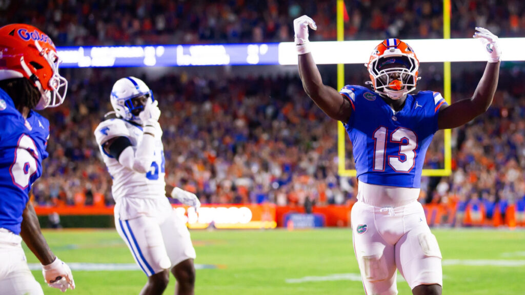 Florida Gators running back Jadan Baugh (13) celebrates his touchdown during the first half at Ben Hill Griffin Stadium in Gainesville, FL on Saturday, October 19, 2024 against the Kentucky Wildcats. [Doug Engle/Gainesville Sun]