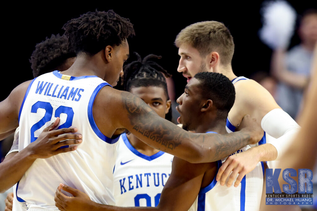 Kentucky players huddle during a game - Dr. Michael Huang, Kentucky Sports Radio