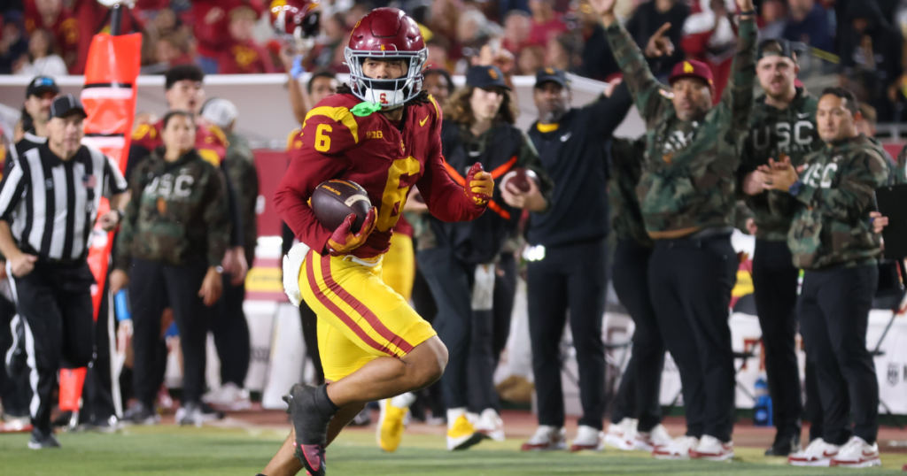 USC receiver Makai Lemon runs for a touchdown during a game against the Rutgers Scarlet Knights