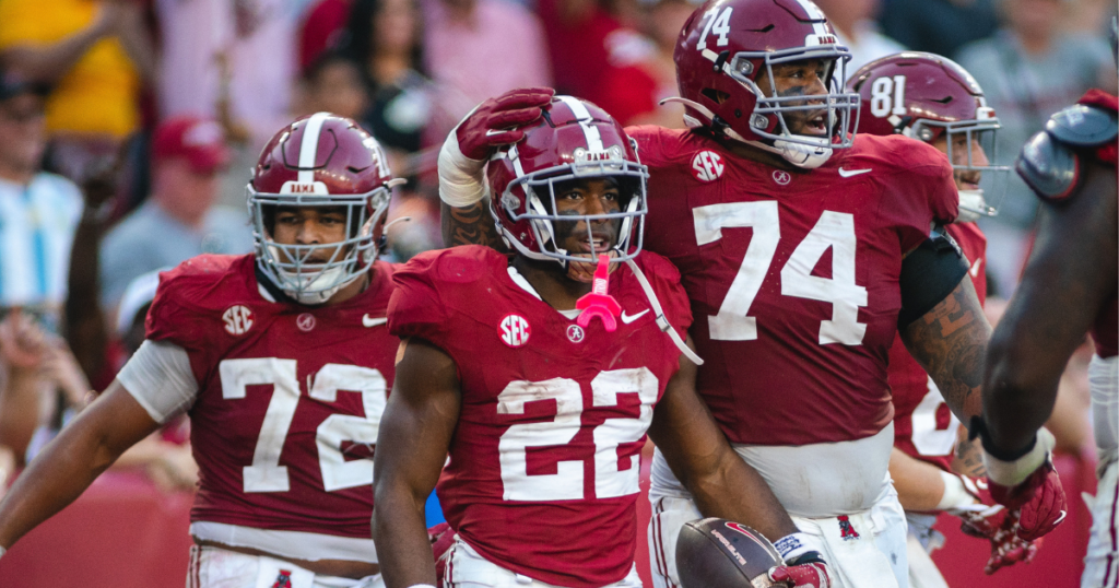 Oct 26, 2024; Tuscaloosa, Alabama, USA; Alabama Crimson Tide running back Justice Haynes (22) celebrates with offensive lineman Kadyn Proctor (74) after scoring a touchdown against the Missouri Tigers during the fourth quarter at Bryant-Denny Stadium. Mandatory Credit: Will McLelland-Imagn Images