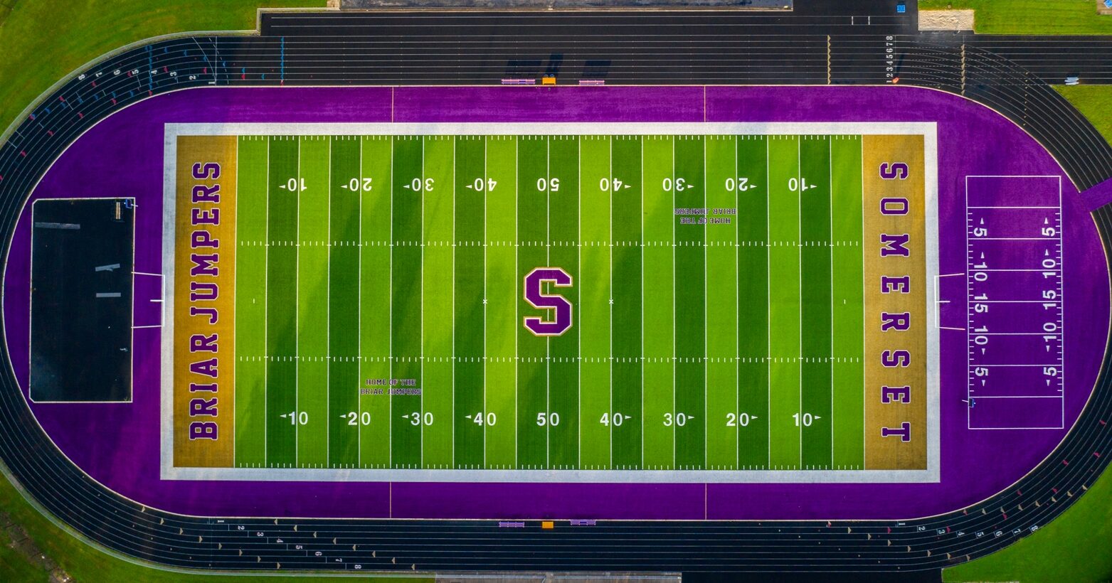 Kentucky high school has miniature football field for kids behind end zone