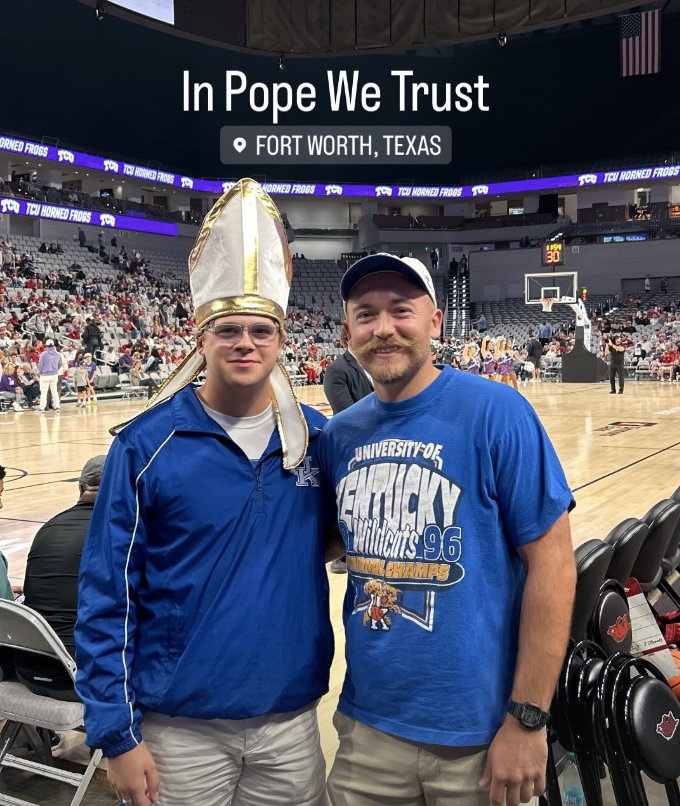 Kentucky fans dressed in Pope gear at an Arkansas game
