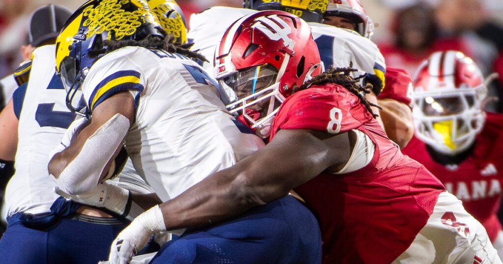 Indiana's CJ West (8) tackeles Michigan's Donovan Edwards (7) during the Indiana versus Michigan football game at Memorial Stadium on Friday, Nov. 9, 2024. (USA Today Syndication)