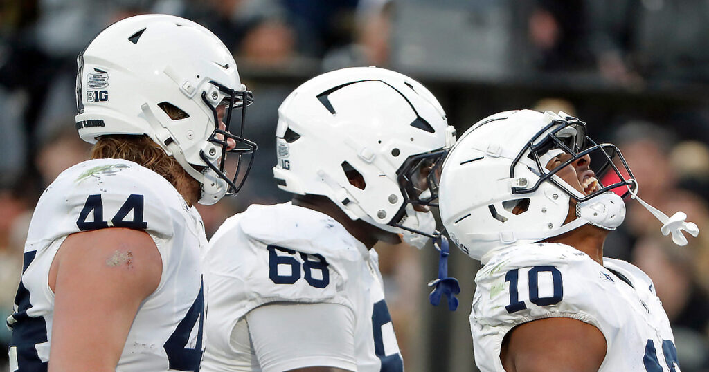 Penn State Nittany Lions running back Nicholas Singleton (10) celebrates with Penn State Nittany Lions tight end Tyler Warren (44) and Penn State Nittany Lions offensive lineman Anthony Donkoh (68) after scoring a touchdown Saturday, Nov. 16, 2024, during the NCAA football game against the Purdue Boilermakers at Ross-Ade Stadium in West Lafayette, Ind. (© Alex Martin/Journal and Courier / USA TODAY NETWORK via Imagn Images)