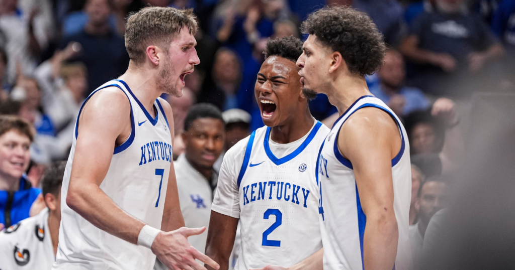 Kentucky Wildcats forward Andrew Carr (7) reacts with teammates after a basket against the Duke Blue Devils during the second half at State Farm Arena. Mandatory Credit: Dale Zanine-Imagn Images