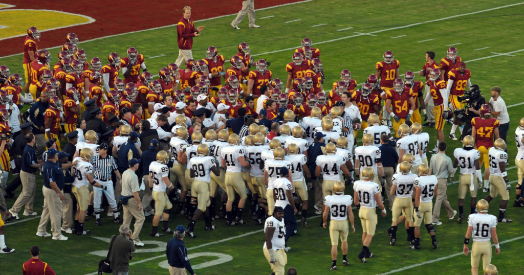 The Notre Dame Fighting Irish and the USC Trojans get into a scuffle during pregame at The Los Angeles Memorial Coliseum