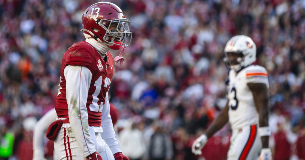 Nov 30, 2024; Tuscaloosa, Alabama, USA; Alabama Crimson Tide defensive back Malachi Moore (13) celebrates after a play against the Auburn Tigers during the second quarter at Bryant-Denny Stadium. Mandatory Credit: Will McLelland-Imagn Images