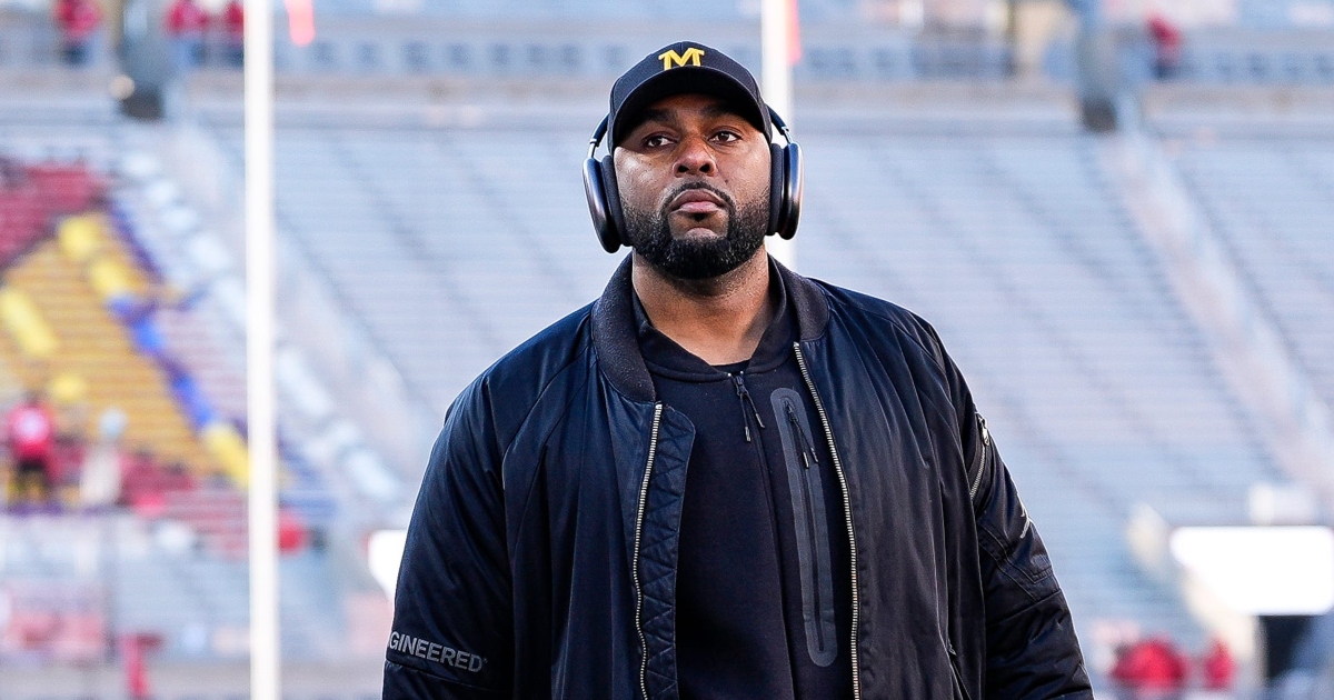 Michigan self imposes reduction in official visits