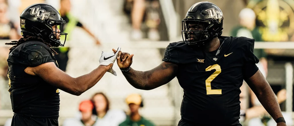 UCF transfer defensive tackle Lee Hunter (right) helping define culture over cost for Texas Tech