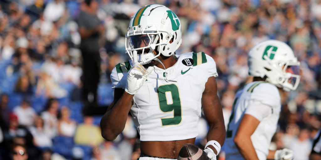 Charlotte 49ers wide receiver O'Mega Blake (9) celebrates after scoring a touchdown during the first half against the Navy Midshipmen at Navy-Marine Corps Memorial Stadium. (Daniel Kucin Jr.-Imagn Images)