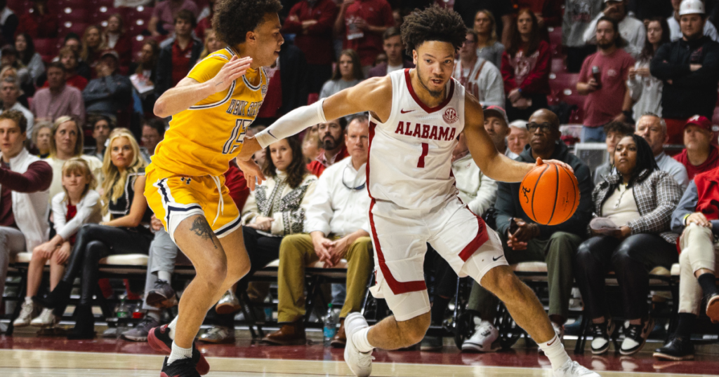 Dec 22, 2024; Tuscaloosa, Alabama, USA; Alabama Crimson Tide guard Mark Sears (1) works against Kent State Golden Flashes guard Jalen Sullinger (13) during the first half at Coleman Coliseum. Mandatory Credit: Will McLelland-Imagn Images