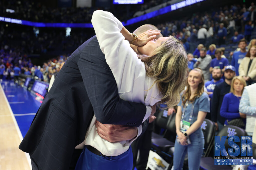 Mark Pope embraces his wife Lee Anne after Kentucky's win over Florida - Dr. Michael Huang, Kentucky Sports Radio