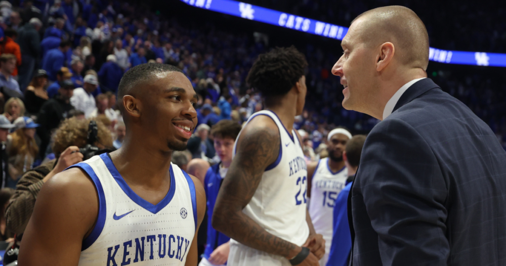 Kentucky coach Mark Pope talks to Lamont Butler after the win over Florida - Dr. Michael Huang, Kentucky Sports Radio