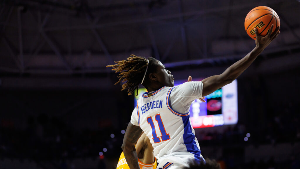 Florida Gators guard Denzel Aberdeen (11) makes a layup during the second half at Exactech Arena at the Stephen C. O'Connell Center. (Matt Pendleton-Imagn Images)