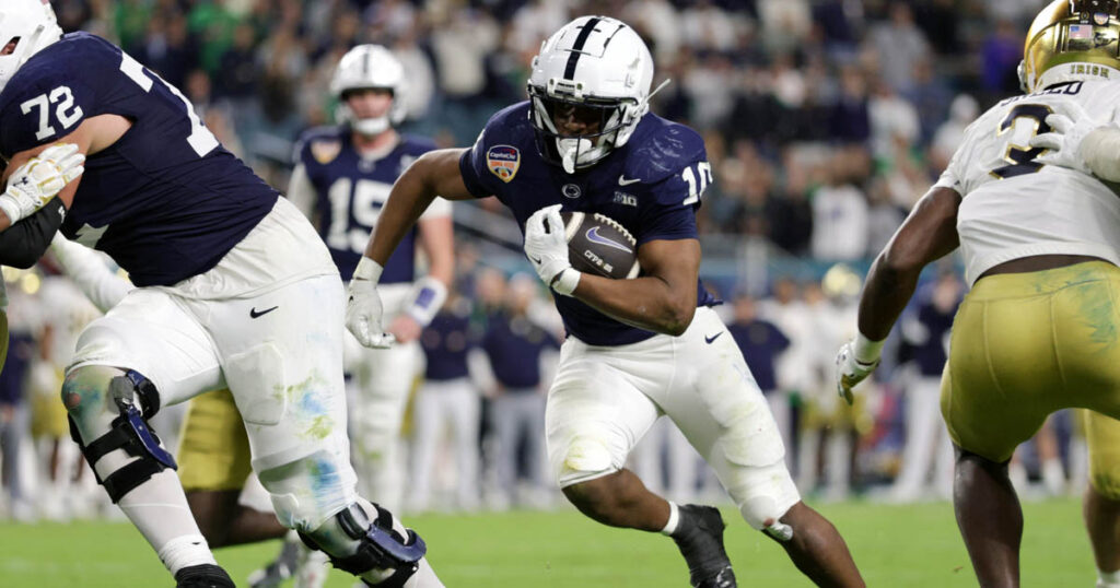 Penn State Nittany Lions running back Nicholas Singleton (10) runs the ball in the second half against the Notre Dame Fighting Irish in the Orange Bowl at Hard Rock Stadium. (Mandatory Credit: Nathan Ray Seebeck-Imagn Images)