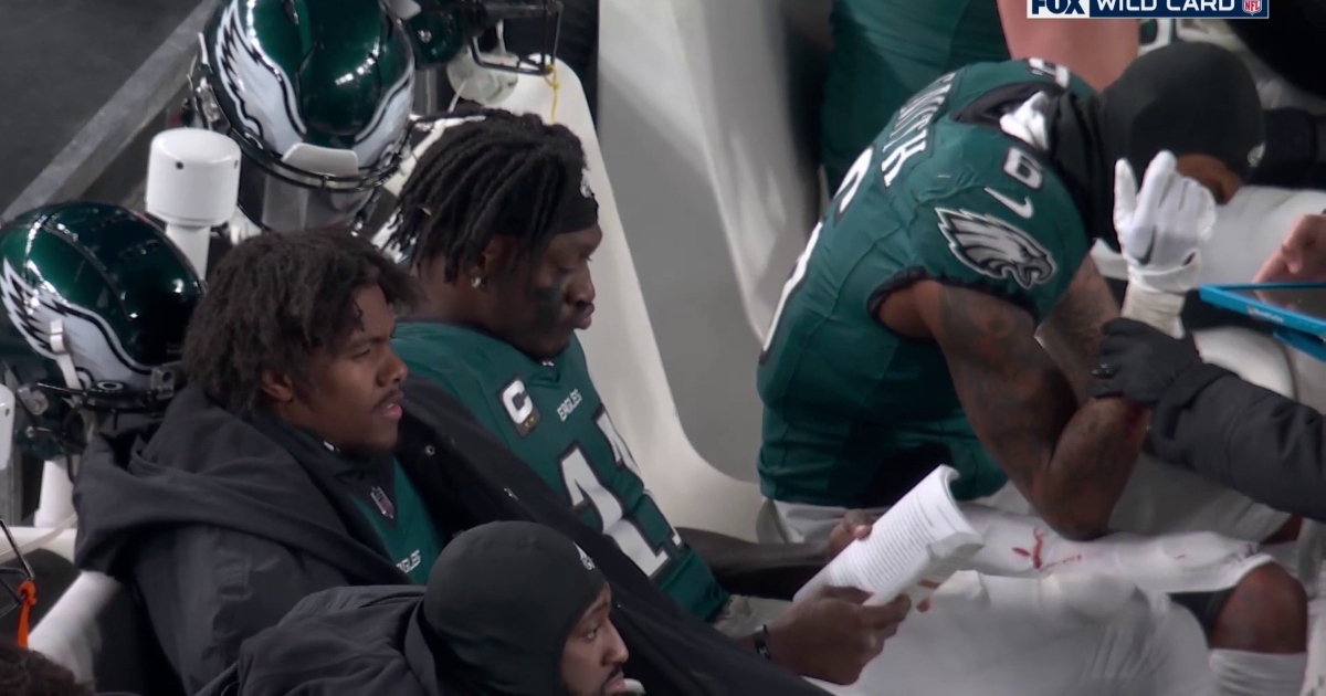 AJ Brown reads book on sidelines during NFC Wild Card game vs. Packers