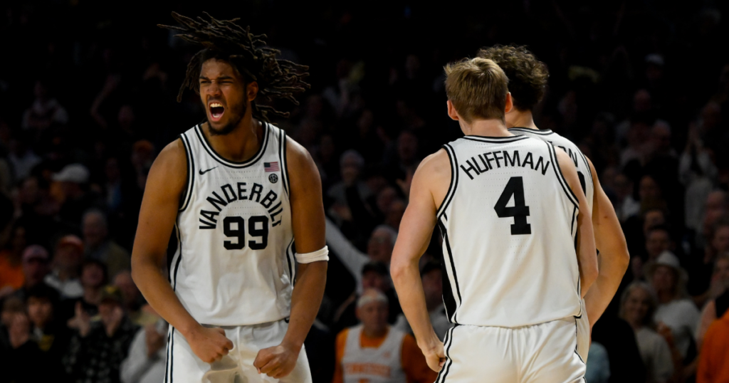 Jan 18, 2025; Nashville, Tennessee, USA; Vanderbilt Commodores forward Devin McGlockton (99) celebrates the upset over against the Tennessee Volunteers during the second half at Memorial Gymnasium. Mandatory Credit: Steve Roberts-Imagn Images