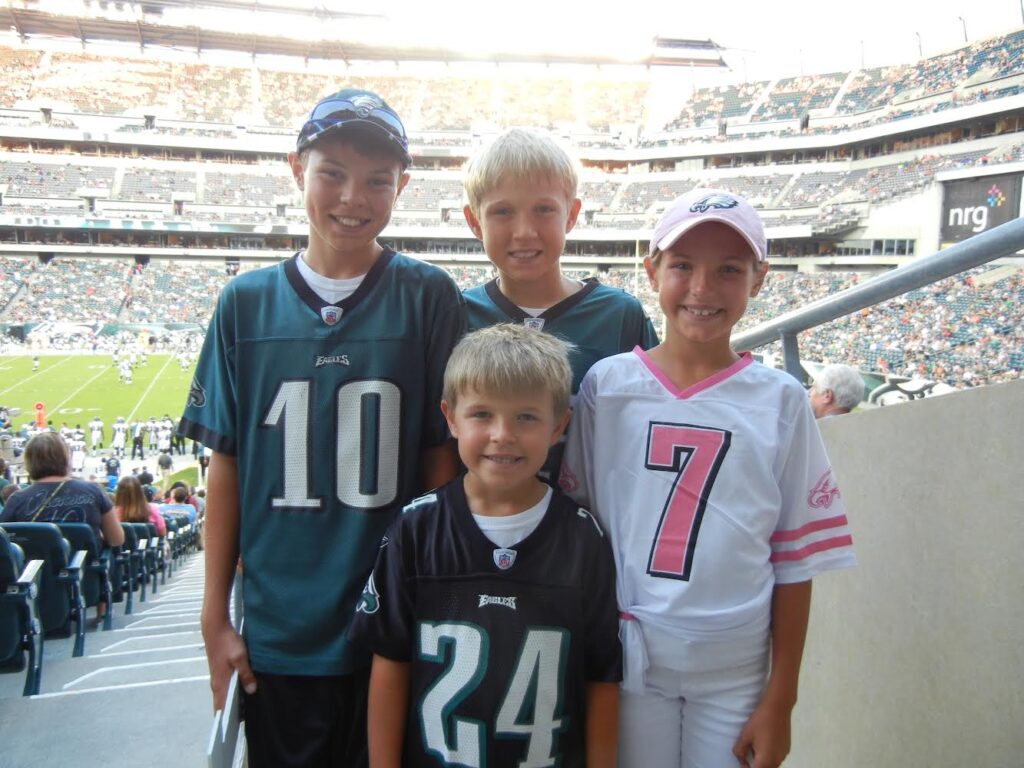 The Carr children at a Phildelphia Eagles game. From left to right: Alexander, Peter, Andrew, Lizzie - Photo courtesy of Phil Carr