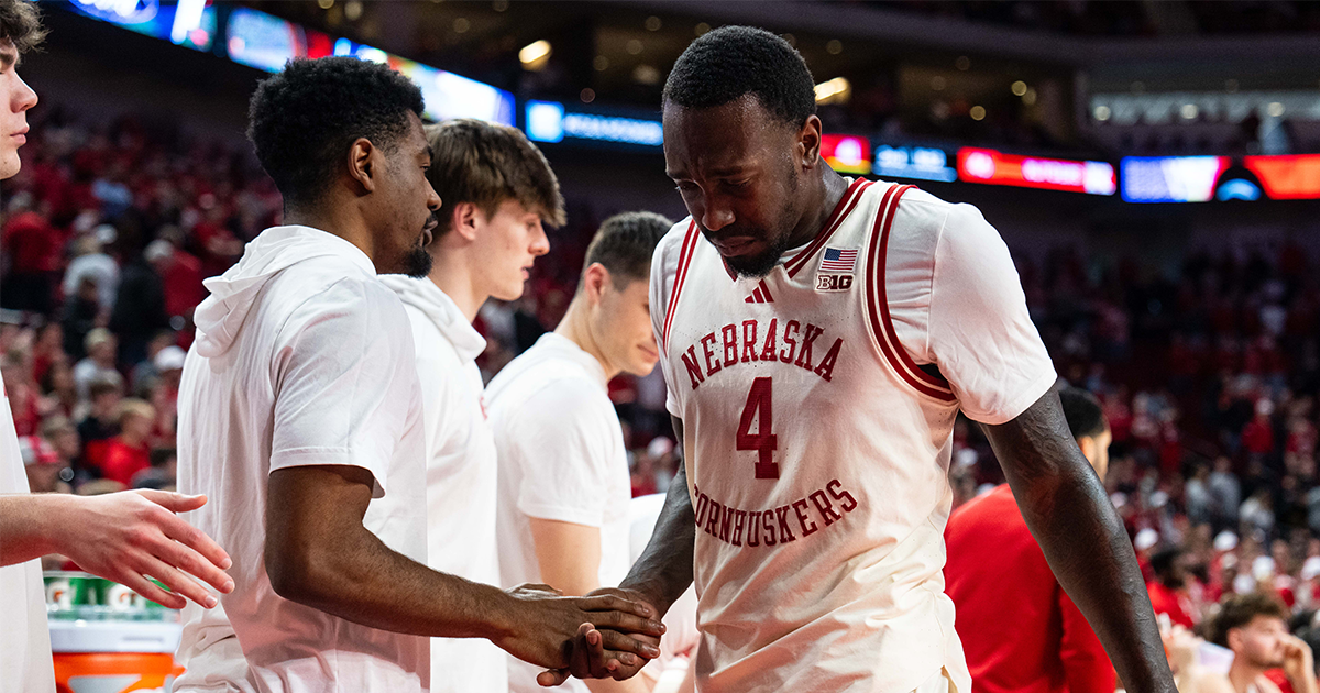 Juwan Gary embraces rival Iowa players after fouling out in regular-season finale