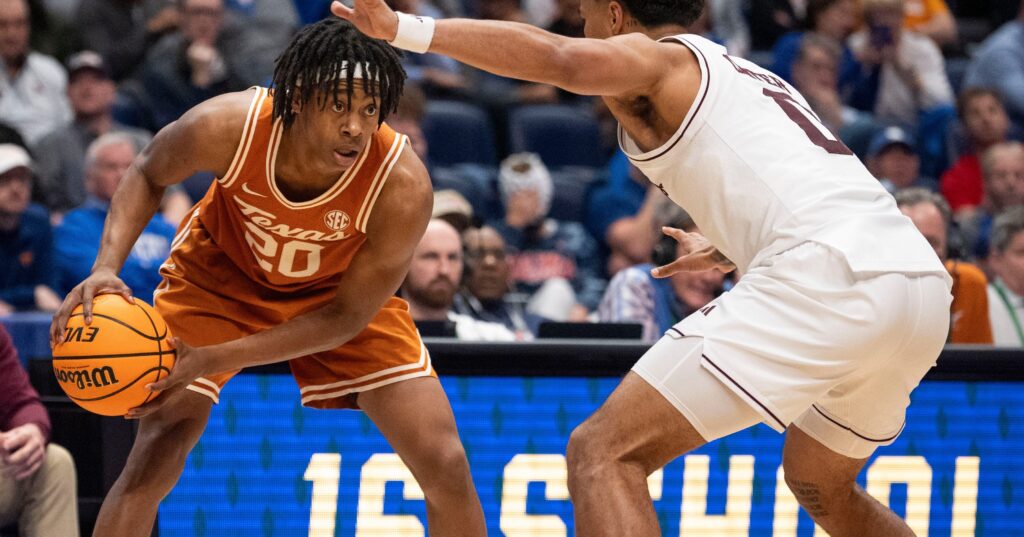 Texas Longhorns guard Tre Johnson (20) looks to pass during their second round game of the SEC Men's Basketball Tournament at Bridgestone Arena in Nashville, Tenn., Thursday, March 13, 2025 (© Nicole Hester / The Tennessean / USA TODAY NETWORK via Imagn Images)