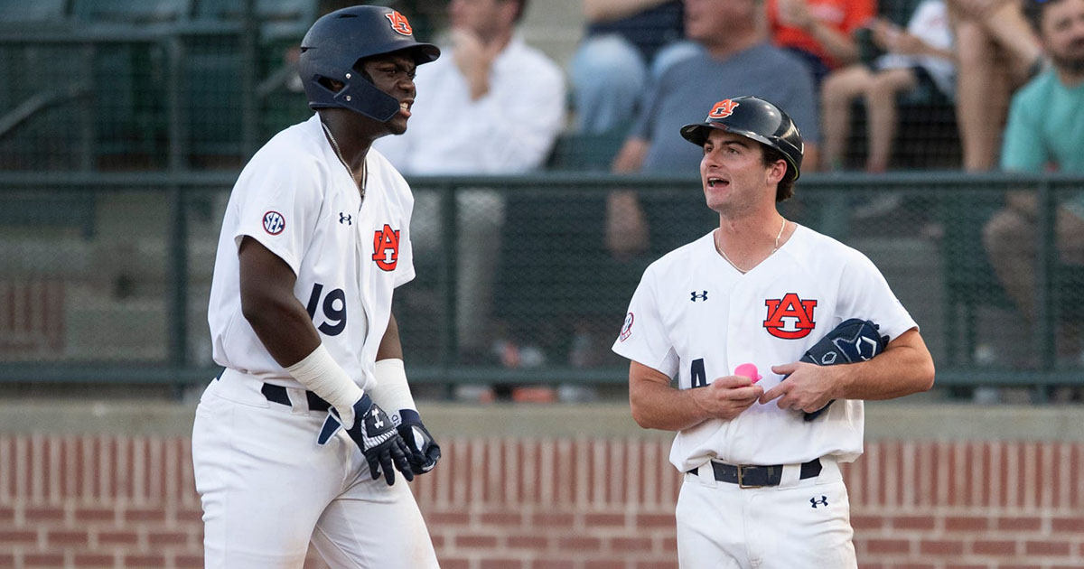 WATCH: Auburn super senior, first base coach hits home run in first at-bat of season