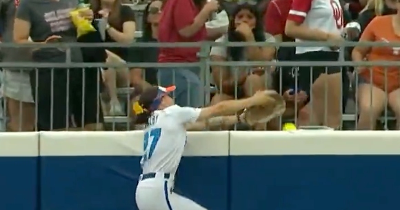 Watch: Texas' Joley Mitchell escapes home run robbery to take 2-0 lead in Women's College World Series