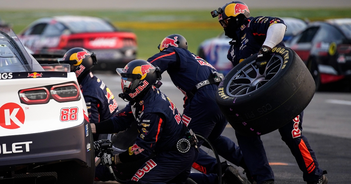 Shane van Gisbergen crew member hit by flying tire from AJ Allmendinger during Pocono pit stops