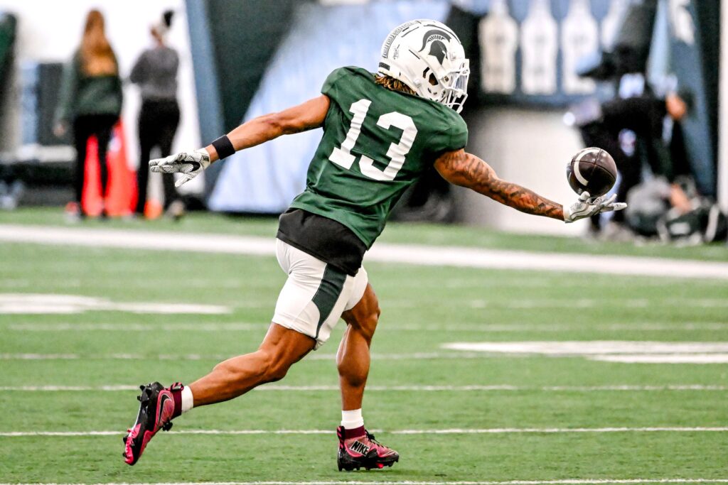 Michigan State wide receiver Chrishon McCray catches a pass during football practice on Tuesday, April 8, 2025, in East Lansing.