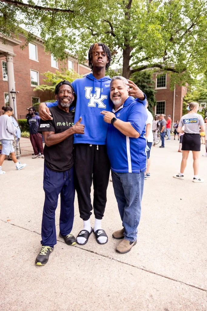 Kam Williams and the Kentucky Basketball team volunteer at the Lexington Rescue Mission - Photo by Chet White, UK Athletics