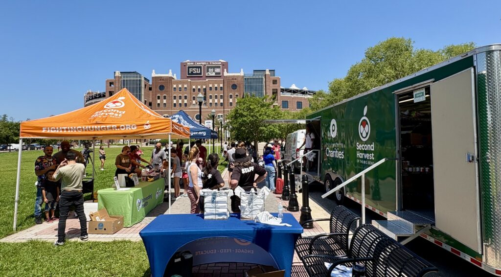 More than 100 Tallahassee residents turned out Tuesday for a charitable event hosted by the Keep Climbing Family Foundation, Second Harvest of the Big Bend and the FSU Food For Thought Pantry. (Ira Schoffel/Warchant)