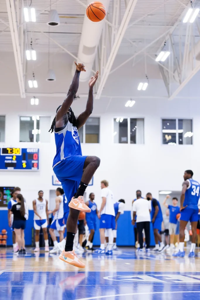 Former Kentucky wing Kahlil Whitney shoots the ball during a La Familia practice - Photo by Caleb Bowlin, UK Athletics