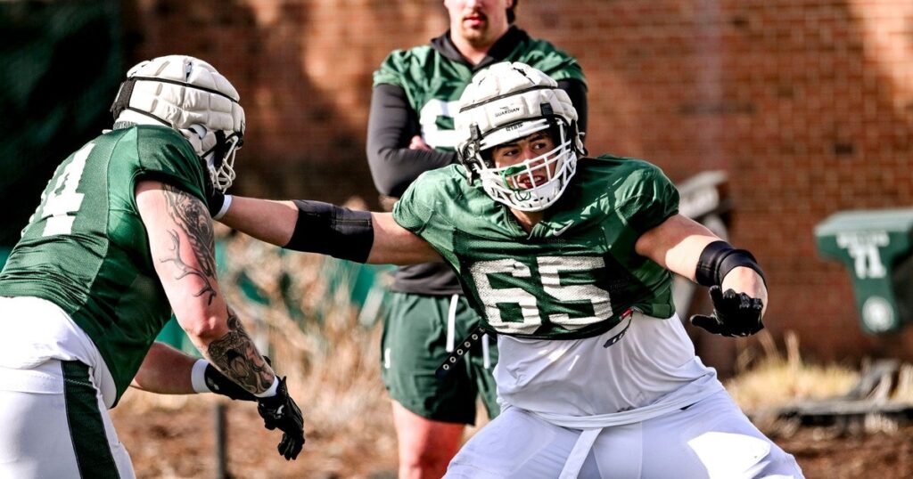 Michigan State offensive lineman Stanton Ramil, right, and Gavin Broscious work out during football practice on Tuesday, April 8, 2025, in East Lansing. © Nick King/Lansing State Journal / USA TODAY NETWORK via Imagn Images