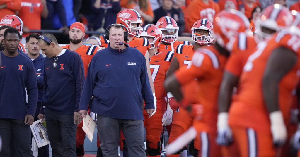 Illinois head coach Bret Bielema watches his team during the first half of an NCAA college football game against Kansas on Saturday, Sept. 7, 2024, in Champaign, Ill. (AP Photo/Charles Rex Arbogast)