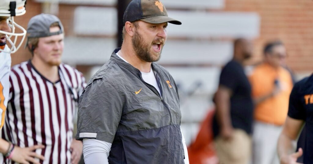 TE Coach Alec Abeln provides instruction during group drill