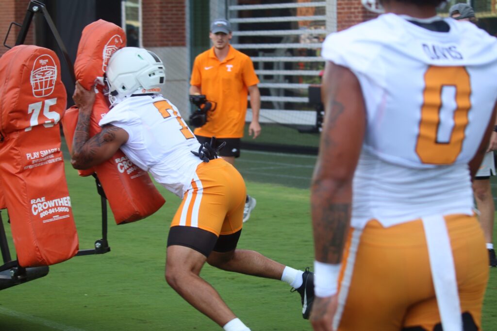 TE Dasaahn Brame gets in work in a sled drill