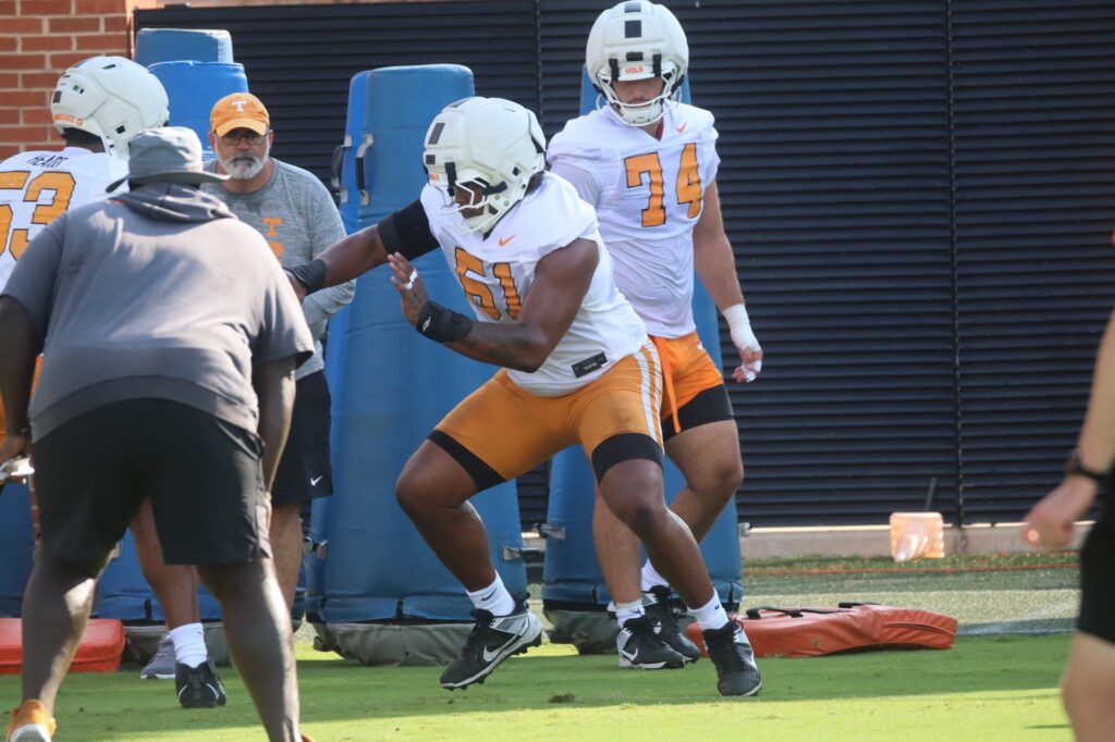 OT Jeremias Heard participates in group OL drill