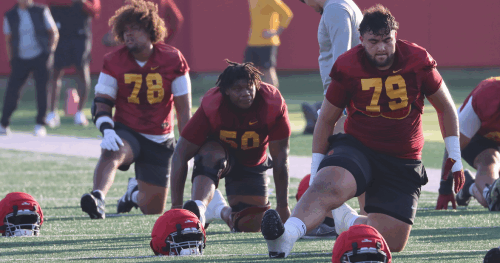 USC offensive linemen Makai Saina, J'Onre Reed and Elijah Vaikona
