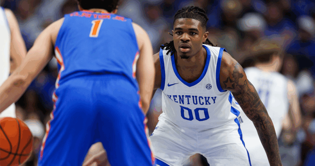 Jan 4, 2025; Lexington, Kentucky, USA; Kentucky Wildcats guard Otega Oweh (0) guards Florida Gators guard Walter Clayton Jr. (1) during the second half at Rupp Arena at Central Bank Center. Mandatory Credit: Jordan Prather-Imagn Images