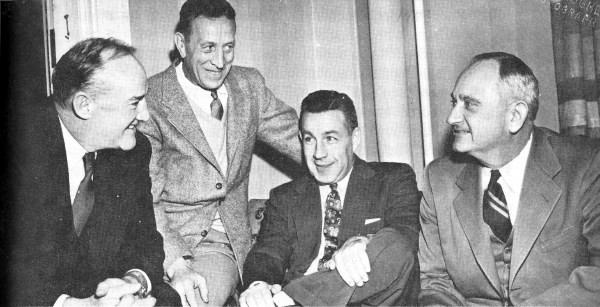 Coaches join Adolph Rupp for the inaugural UKIT in 1953. From left to right, Ken Loeffler (LaSalle), John Wooden (UCLA), Harold Bradley (Duke) and Rupp, via John Scott's Big Blue History.