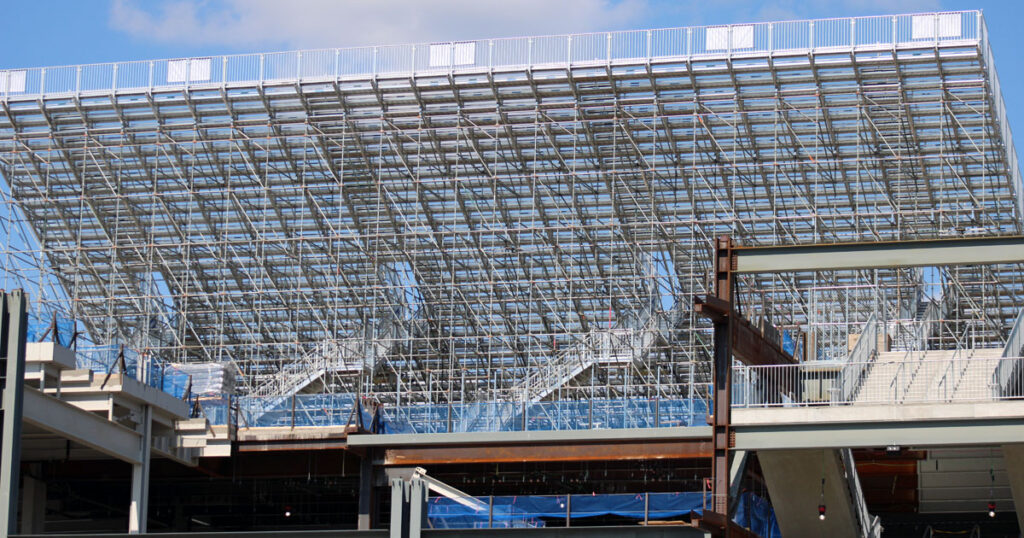 Temporary bleachers stand in front of a walk way on the west side of Beaver Stadium on Aug. 13, 2025. (Pickel/BWI)