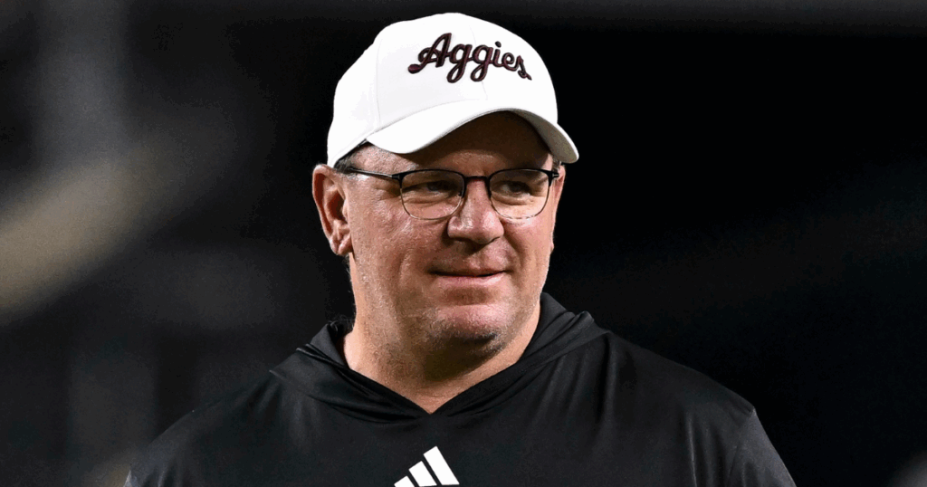 Nov 16, 2024; College Station, Texas, USA; Texas A&M Aggies head coach Mike Elko walks on the field prior to the game against the New Mexico State Aggies at Kyle Field.
