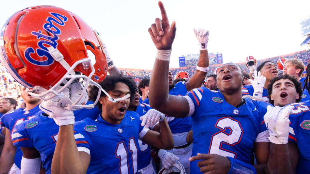 Florida Gators wide receiver Aidan Mizell (11) and quarterback DJ Lagway (2) celebrate at Ben Hill Griffin Stadium in Gainesville, FL on Saturday, November 23, 2024. The Gators defeated the Rebels 24-17 [Doug Engle/Gainesville Sun