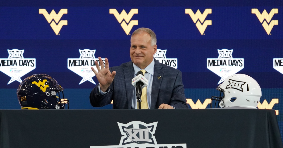 West Virginia QB battle: Rich Rodriguez debates naming starter before season opener