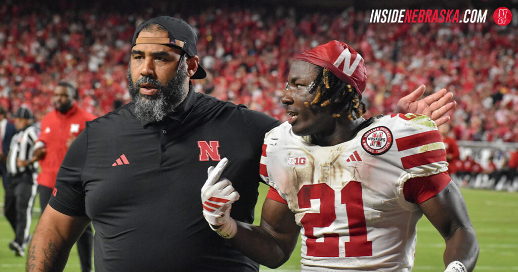 Nebraska OLB coach Phil Simpson and RB Emmett Johnson