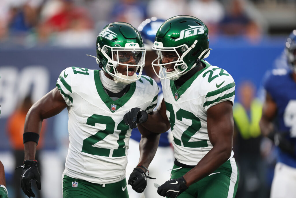 New York Jets cornerback Brandon Stephens (21) celebrates a defensive stop with safety Tony Adams (22) during the first half against the New York Giants at MetLife Stadium.