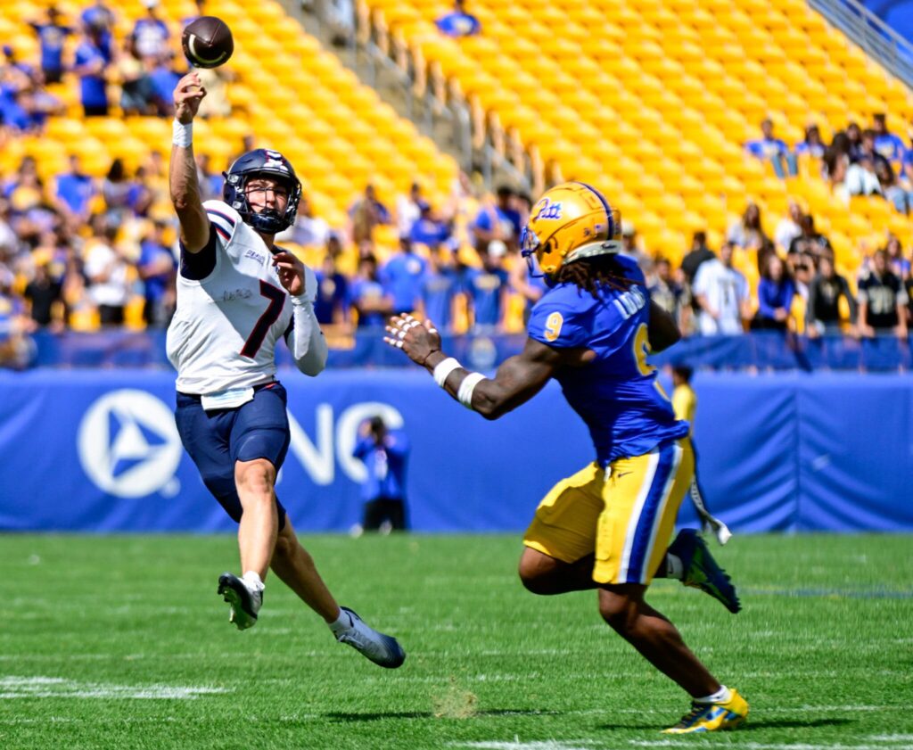 Former WPIAL quarterback Logan Kushner throws a pass while linebacker Kyle Louis defends. Aug. 30, 2025 - Ed Thompson / PSN
