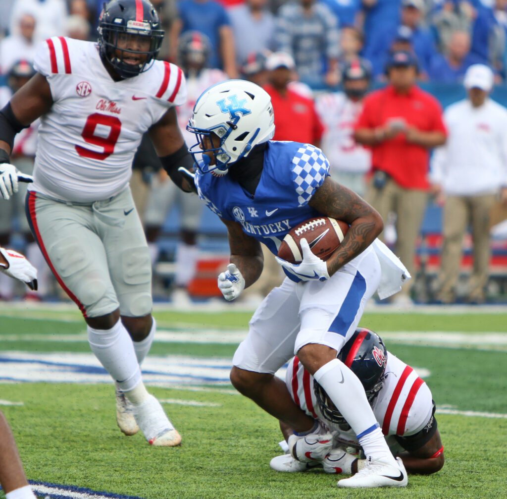 Kentucky's Lynn Bowden tried to break an Ole Miss tackle in the Wildcats' clash with the Rebels during the 2017 season. (Jeff Drummond/Cats Illustrated)