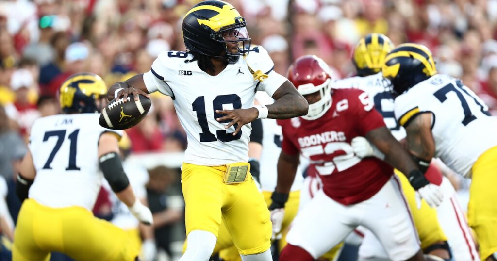 Sep 6, 2025; Norman, Oklahoma, USA; Michigan Wolverines quarterback Bryce Underwood (19) looks to pass downfield against the Oklahoma Sooners during the first half at Gaylord Family-Oklahoma Memorial Stadium. Mandatory Credit: Kevin Jairaj-Imagn Images