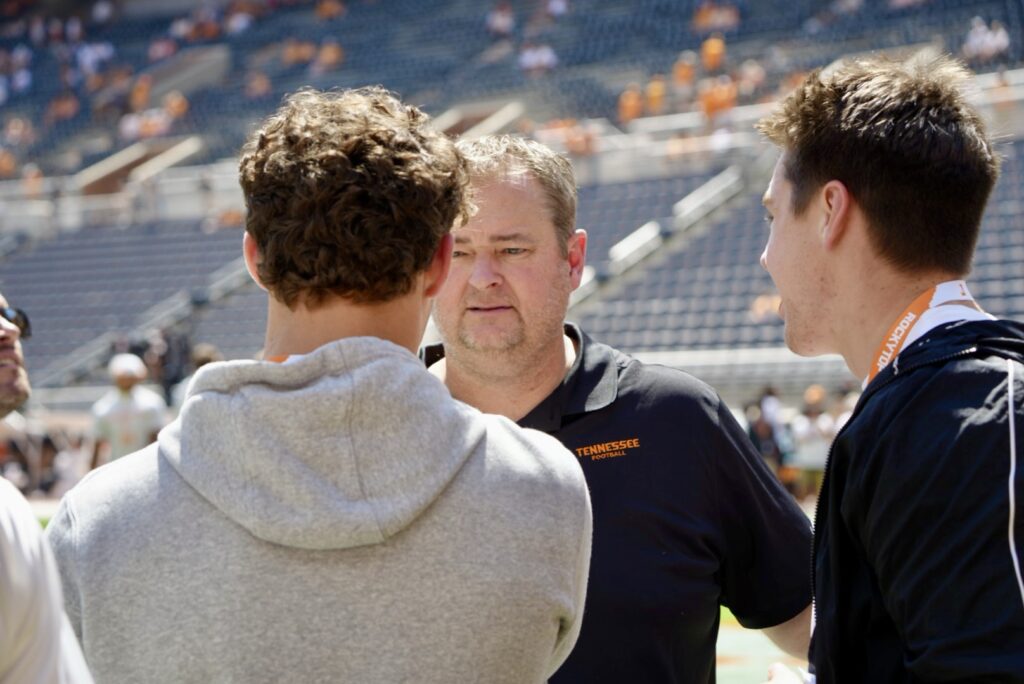 Josh Heupel greets Cooper Witten and JP Peace