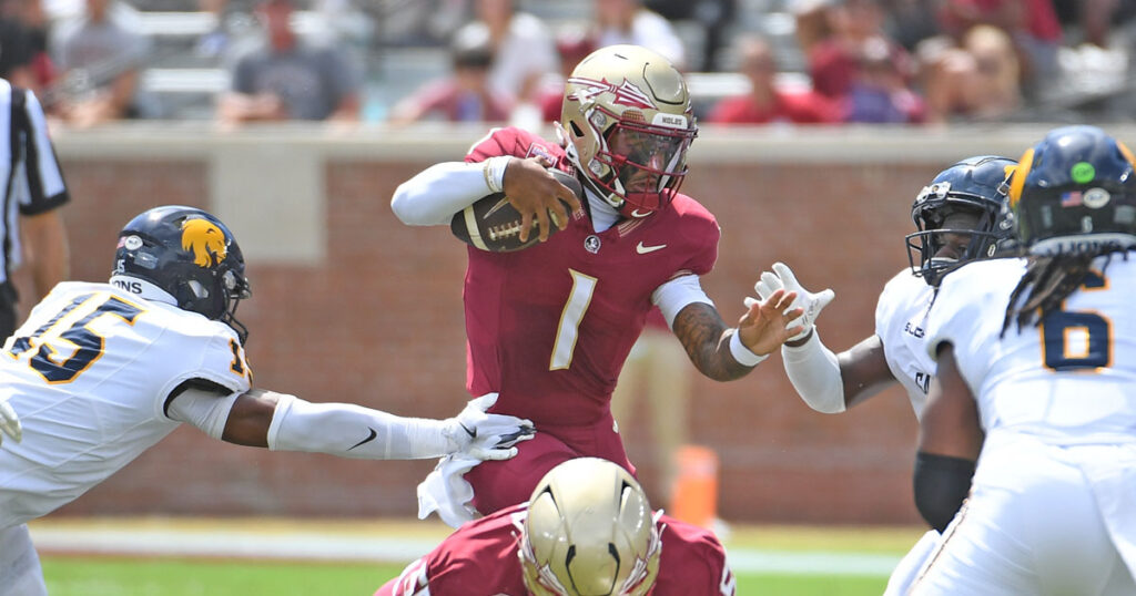 FSU QB Tommy Castellanos eludes defenders last week against East Texas A&M. (Bob Myers/Special to Warchant)